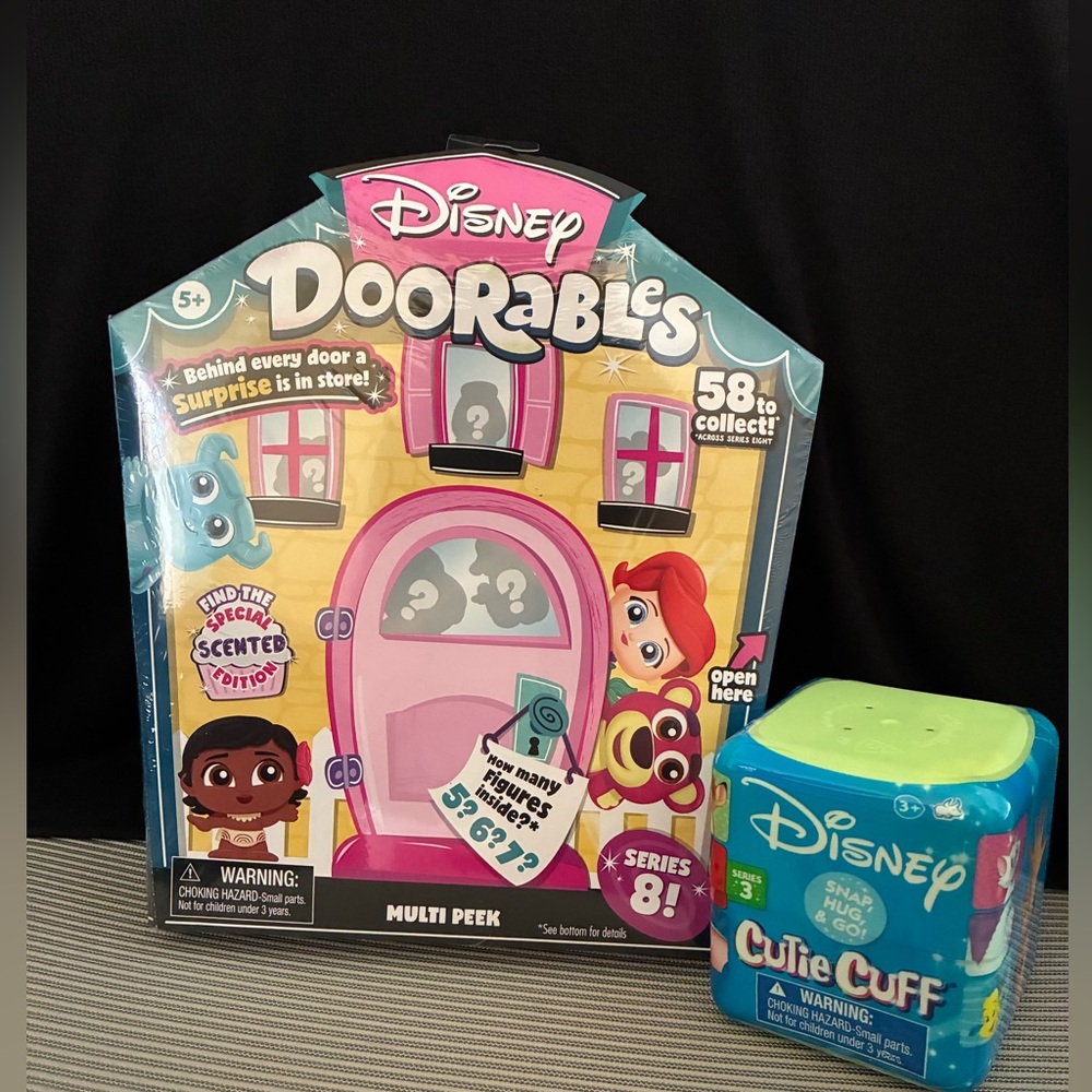 Disney Doorables Series 8 set unopened. Plus mystery Disney Cutie Cuff! New